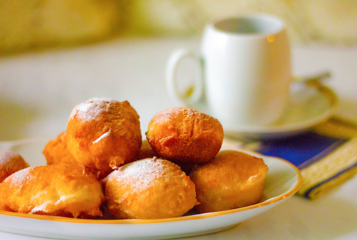 fried round donuts on a plate concept of breakfas 2022 11 01 09 18 42 utc