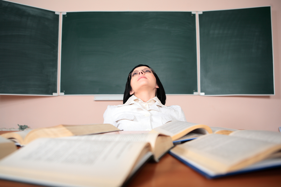 bigstock young teacher woman on green b 26122838