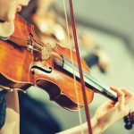 playing the violin 765x510