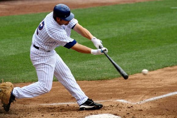 1370533030 baseball player hit ball