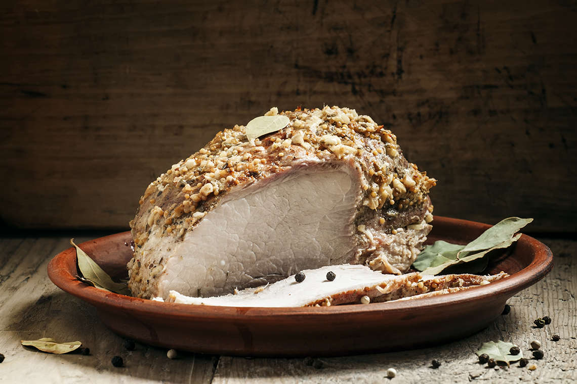 delicious baked ham pork on a clay tray 2021 08 28 20 17 43 utc