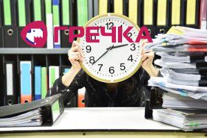 office worker holding a clock working overtime an 2022 11 09 14 57 47 utc copy