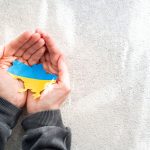 hands holding national flag of ukraine in the shap 2022 12 11 23 59 24 utc