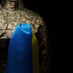 ukrainian soldier holds a flag of the independent 2022 05 01 23 54 27 utc