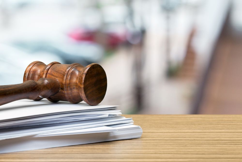 wooden gavel on table close up