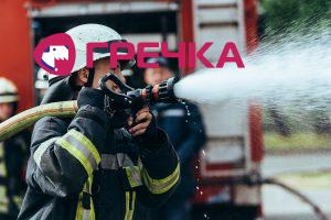 selective focus of firefighter with water hose ext 2022 12 16 15 44 19 utc