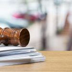 wooden gavel on table close up