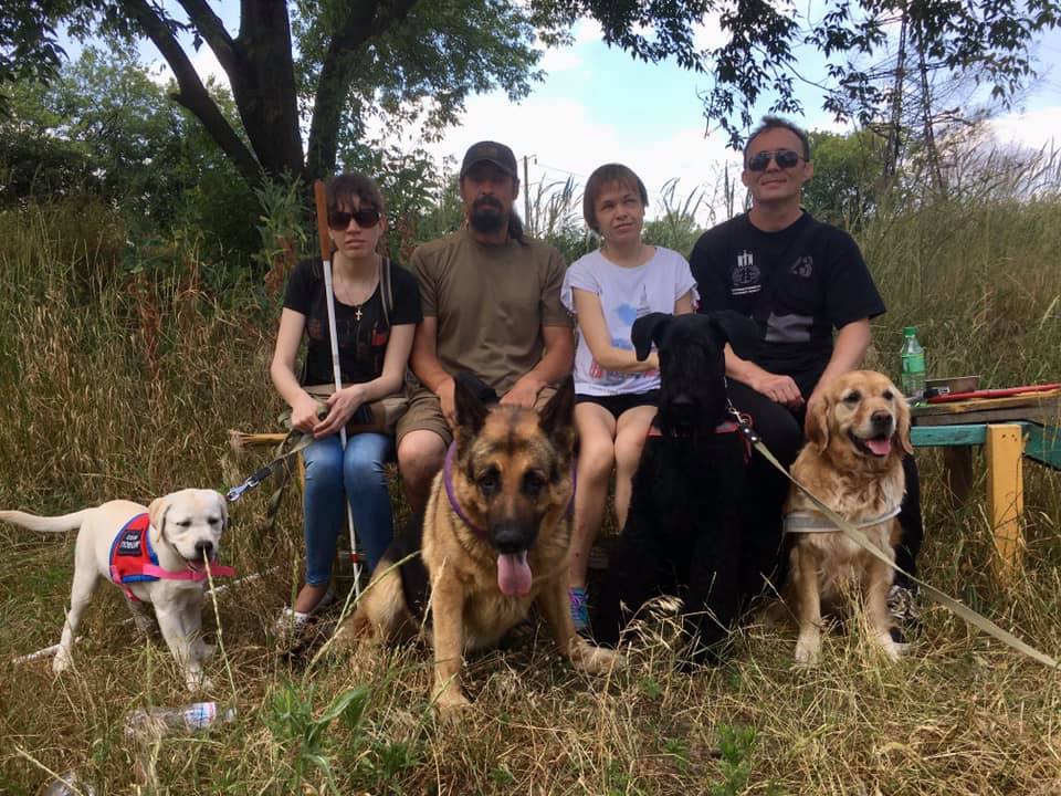Анна Бойкова з собакою-поводирем